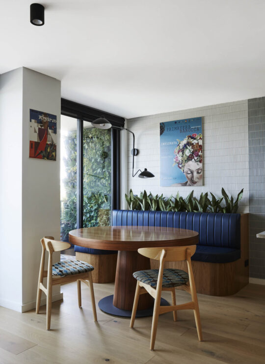 Bespoke and curated small round timber dining area by Denby Dowling Interior Design