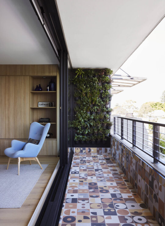 Bespoke colourful patterned tiles on balcony by Denby Dowling Interior Design